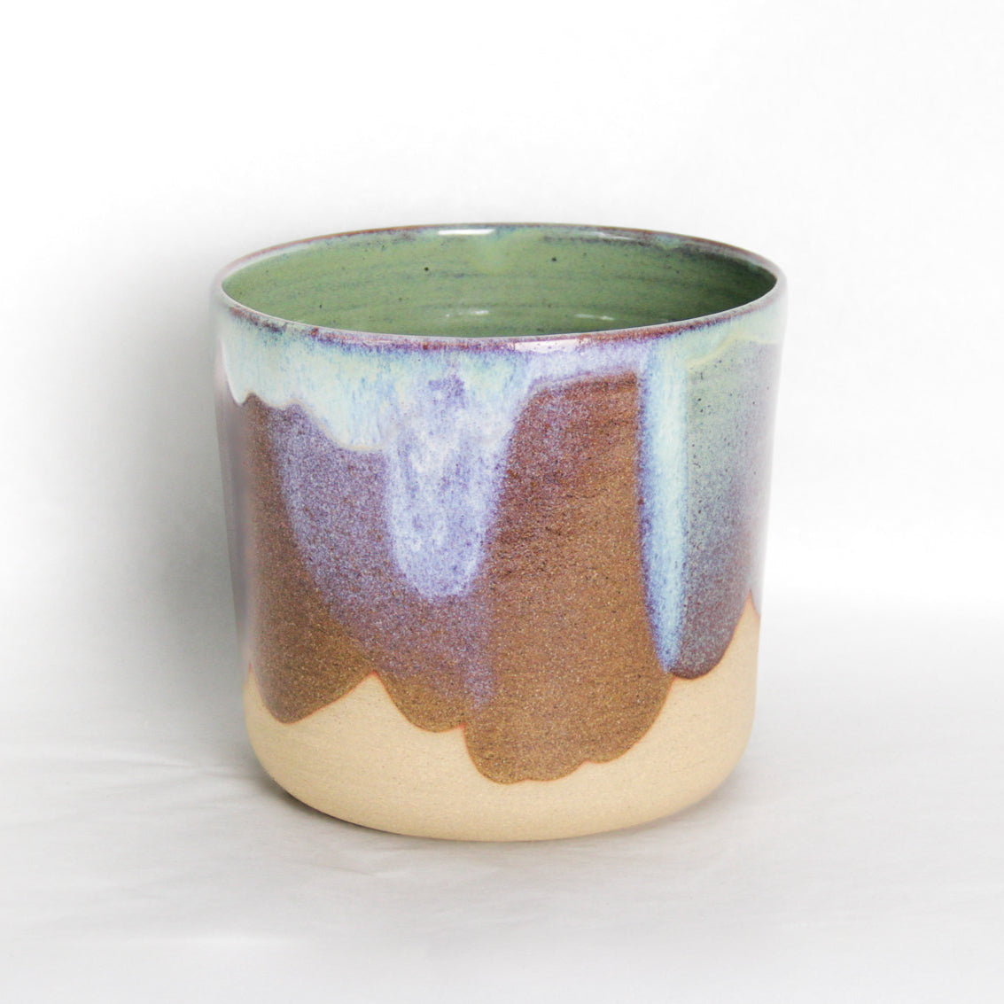 Image d'un cache-pot en grès coloré.