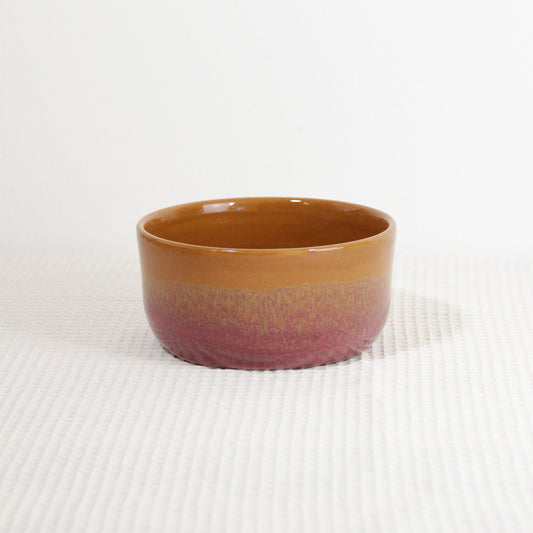 Image d'un bol bicolore rose et caramel en céramique artisanale